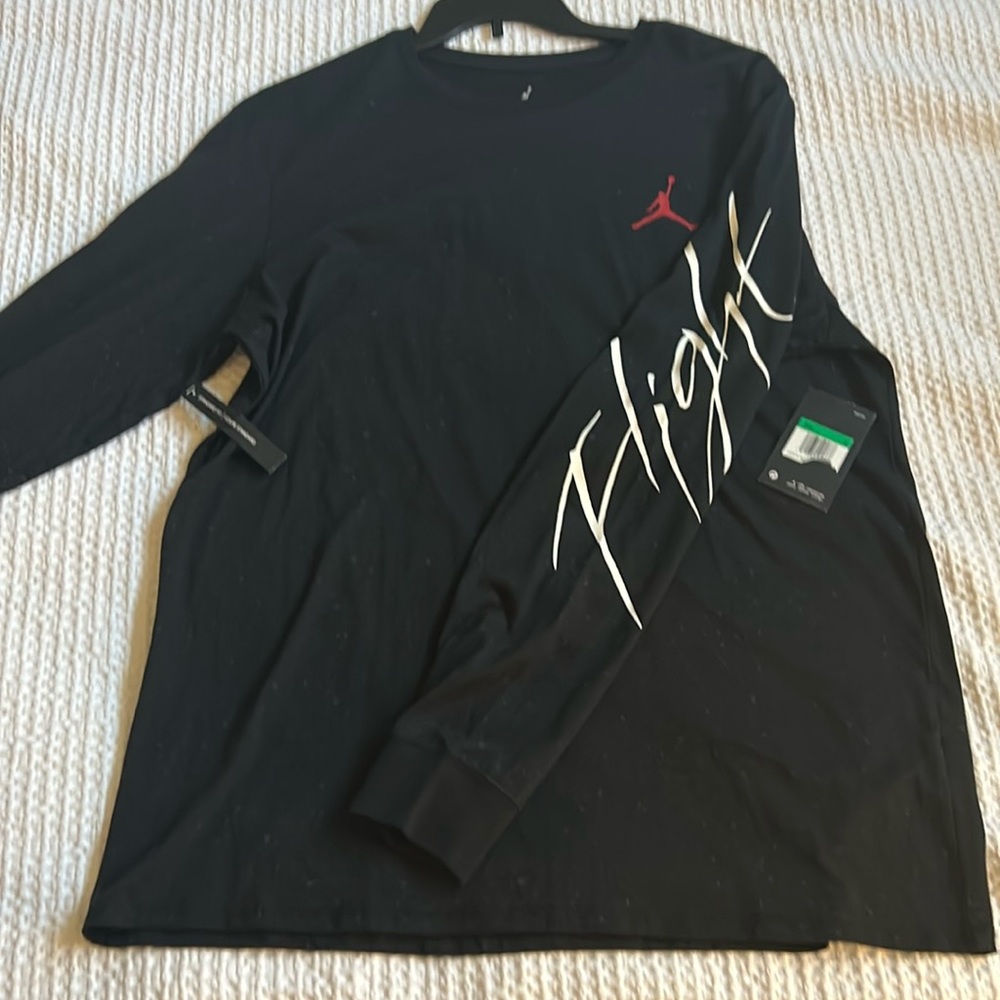 New with tags!  Nike Michael Jordan Flight long sleeve shirt!